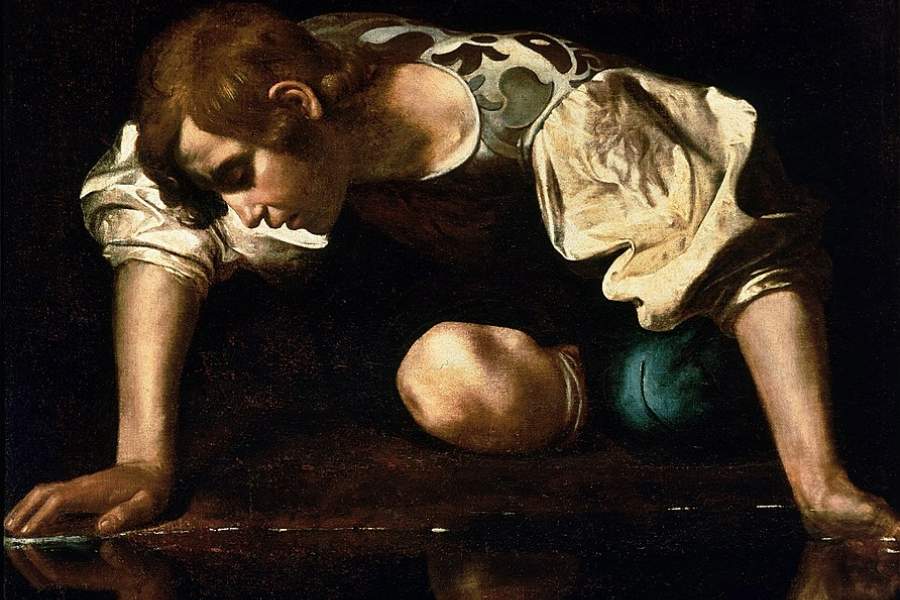 Narcissus staring at himself by Caravaggio