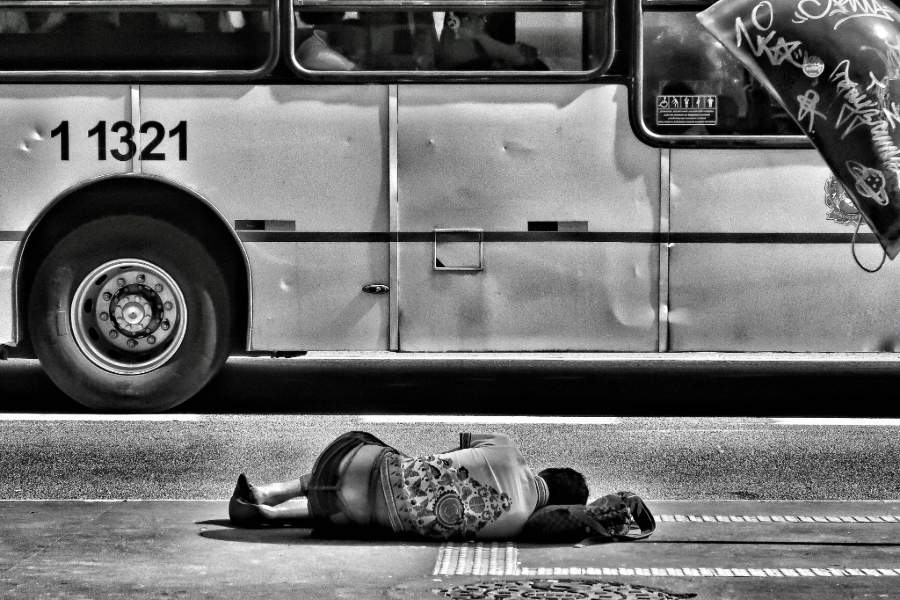 Unemployed laying on the ground poverty